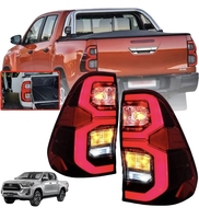Feux arrière LED rouges/transparents/fumés JOP4X4 pour Toyota Hilux Revo 2015-2024 avec logo Hilux