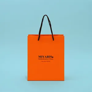 Jewelry Cosmetic Orange Wholesale Price Paper Bags With Black Handle For Shopping