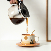 Ensemble de soucoupe de tasse à café en céramique jetable moderne avec motif de dessin animé 220ml Design Sense Niche