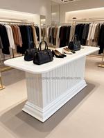 Table de présentation en bois peint blanc durable pour boutique de vêtements, magasin de sacs