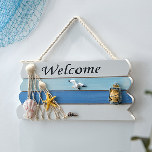 Letrero de bienvenida mediterráneo de madera con conchas marinas, estrellas de mar y linterna, decoración para puerta de casa, madera de pino, forma irregular - Product Image 5