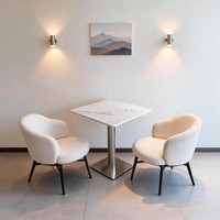 Ensemble table et chaises de café, table carrée en marbre avec chaises bouclées pour deux personnes, idéal pour petit café et salon.