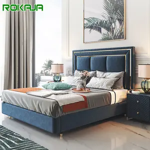 High End Double Bed Upholstered Exclusive Queen Size Bed Metal Edge Genuine Leather Bed Luxury Bedroom Furniture