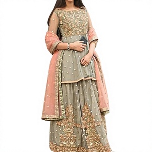 Tenue de soirée élégante avec de magnifiques broderies sur un kurta stylé et une robe lehenga pour les fêtes et les mariages - Product Image 1