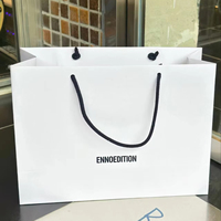 Maßgefertigte Umweltfreundliche Luxus-Papiertüte mit UV-Logo-Laminierung aus Recyclingmaterialien für Boutique-Verpackungen
