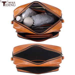 กระเป๋าหนังแท้สะพายข้าง สีน้ำตาลอ่อน สำหรับทุกเพศ พกพาสะดวก ทรงสี่เหลี่ยมแนวนอน ปิดด้วยซิป - Product Image 3