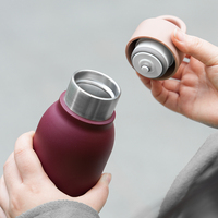 Bouteille d'eau courante portable en acier isolée à ouverture par clic en vrac en gros Bouteille de sport pour la salle de sport