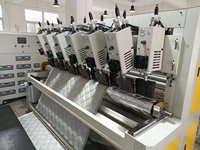 Machine à matelasser à ultrasons de type pneumatique