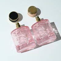 Flacon de parfum en verre rose cylindrique moderne de 50 ml et 100 ml, avec couvercle à motif cuir, logo personnalisé OEM disponible