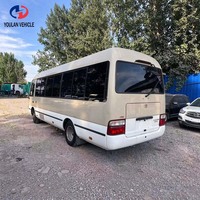 Autobus Coaster à essence économiques vendus en Chine, dotés de 23 sièges fixes et de 6 sièges pliants
