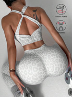 Ensemble de sport sans couture imprimé léopard pour femme : Leggings taille haute froncés aux fesses et brassière de sport dos croisé – Tenue de yoga et d'entraînement