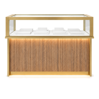 Vitrine îlot en acier inoxydable à grain de bois avec finition dorée et éclairage LED pour bijoux, parfums, cosmétiques, showroom, vente en gros