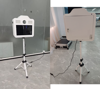 Photomaton tendance avec écran tactile de 15,6 pouces et deux éclairages de remplissage à luminosité réglable pour les événements d'anniversaire