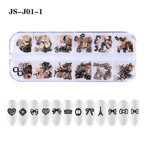 Paso Sico <span class=keywords><strong>2021</strong></span> 24 diseños 12 espacios en blanco Metal mixto patrón pequeño remache Retro colores Flor Mariposa corazón estrella Nail Art diseño 3D - Product Image 6