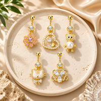 CRYSPURE 14g Piercings de nombril en acier chirurgical doré pour femmes, avec zircon AAA, pendentif cœur et fleur, bijoux de piercing de nombril, vente en gros OEM