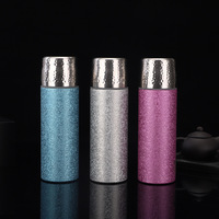 Nouveau matériau personnalisé bouteille d'eau de sport ultralégère à double paroi en titane tasse d'isolation thermique pour la randonnée camping pique-nique