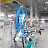 Étiqueteuse automatique à plan rond et plat
