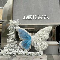 Grandes décorations de fleurs artificielles en forme de papillon personnalisables pour les mariages