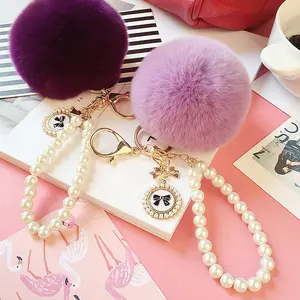 2022 Offre Spéciale Pas Cher Promotionnel Perle Chaîne Charme Duveteux Mignon 8cm Faux Fourrure Clé houlde Pompon Boule De Fourrure Pom Keychain