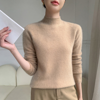 Pull élégant en cachemire à col montant pour femme, coupe ajustée, fin tricoté, idéal pour superposer