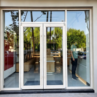 Porte d'entrée double battante robuste en alliage d'aluminium blanc sur mesure, style KFC, pour restaurant de restauration rapide