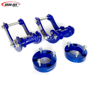 Grilletes G extendidos de ballesta trasera 2-1/2 "y espaciador de choque de resorte helicoidal delantero para Navara - Product Image 1