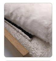 Lit surélevé pour animaux de compagnie en bois massif minimaliste avec coussin rebondi moelleux et matelas texturé lavable