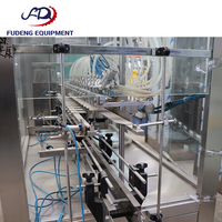 Machine de remplissage automatique de liquides à performance stable, équipement de remplissage de bouteilles en acier inoxydable à commande servo pour liquides fluides