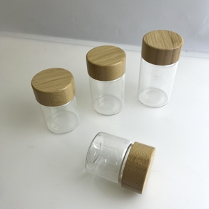 ขวดแก้วใสแบบกำหนดเองสำหรับเด็ก ป้องกันการเปิดโดยไม่ได้รับอนุญาต บรรจุภัณฑ์สำหรับดอกไม้แห้งและมูนร็อค ขนาด 4 ออนซ์ พร้อมฝาไม้พิมพ์ลาย - Product Image 1