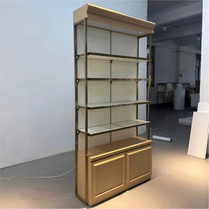 Étagère murale de présentation pour magasin avec armoire, gondole murale, étagères à cadre doré, vitrine de présentation à panneaux rainurés - Product Image 3