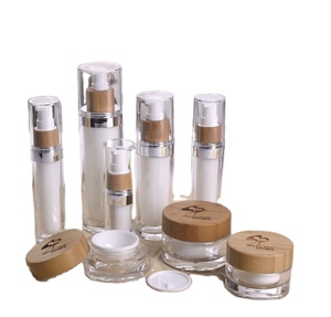 Recipientes acrílicos de loção, garrafa de loção acrílica de 100ml de luxo cosmético com tampas de madeira - Product Image 1