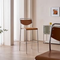Tabouret de bar industriel Shanmu en métal, configuration à pédale, sensation haut de gamme et luxueuse, design minimaliste, usage commercial
