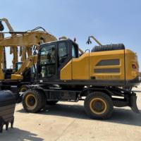 Excavatrice sur pneus d'occasion XE210WGA en excellent état avec pompe et boîte de vitesses, modèle 2020, poids opérationnel de 21000 kg
