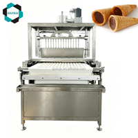Machine automatique GUSU pour le remplissage de chocolat et le dépose de biscuits
