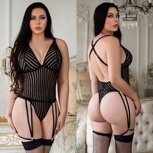 sexy strip lingerie sexy girl in black lingerie sitting on cheerful man in bedroom Stock Photo  by LightFieldStudios main image 0