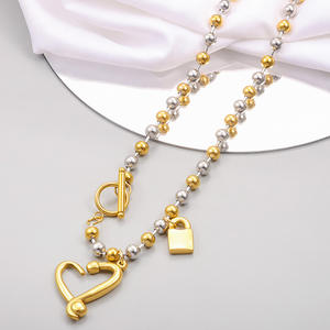 Demande catalogue Collier unisexe <span class=keywords><strong>uno</strong></span> de 50 bijoux en acier inoxydable plaqué or pour femmes avec pendentif en perles colorées avec cadenas en forme de coeur vente en gros - Product Image 4