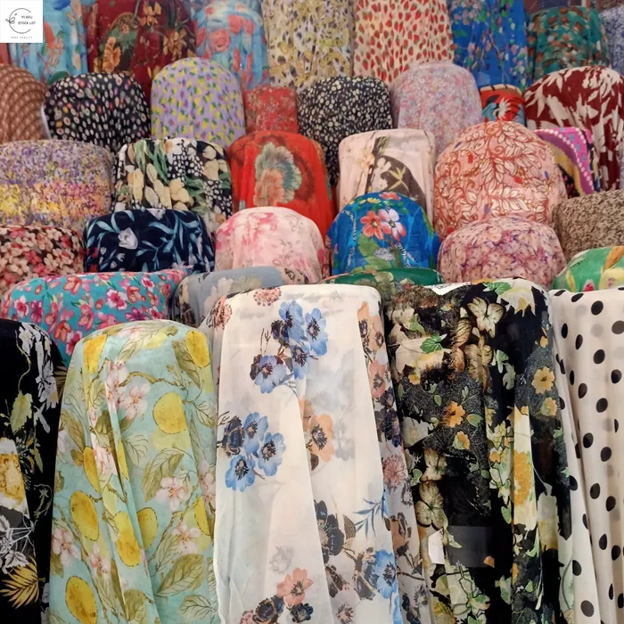 Popular woven polyester wholesale printed floral silk chiffon fabric stock lot for women garment dress