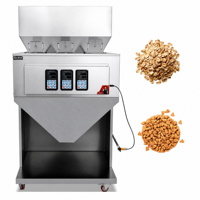 De multifunctionele driekoppige semi-automatische verpakkingsmachine voor korrelige producten is geschikt voor gedroogd fruit en andere materialen.