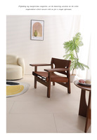 Fauteuil lounge surdimensionné en bois Baisheng, capitonné en cuir véritable, ergonomique, écologique, style nordique moderne, pour hôtel et salon