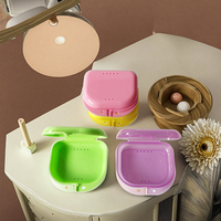 Boîte à prothèses dentaires en plastique coloré invisible stockage aligneur prothèses dentaires orthodontiques sac de retenue