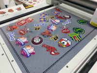 Nouvelle conception Imprimante d'étiquettes 3D UV A1 60 cm en TPU pour impression rouleau à rouleau sur vêtements, tissu PVC, papier couché avec Xp600 DX7 HD3200U