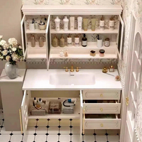 Ensemble de meuble-lavabo mural XINGRUO de style français vintage en chêne laqué avec miroir intelligent et lavabo monobloc en céramique effet pierre.