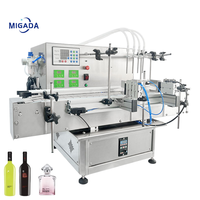 Machine de remplissage automatique de liquides à 4 têtes pour jus, vin, huile comestible, essence, eau minérale en bouteilles de verre