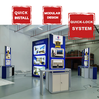 Stand d'exposition portable 20x20 pieds personnalisé pour salon professionnel, avec bannière suspendue rétroéclairée pour publicité