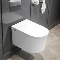 Vente chaude Ensemble de toilettes intelligentes de haute qualité Réservoir encastré Dos au mur Salle de bain WC sans réservoir Rond Télécommande incluse
