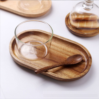 Petite assiette de service ovale en bois d'acacia