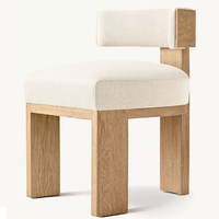 Chaise de salle à manger rembourrée Elgin de style mid-century avec structure en chêne massif à trois pieds, dossier angulaire, silhouette audacieuse pour les salles à manger à domicile