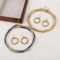 Boucles d'oreilles torsadées multi-couches en trois lignes, style européen et américain, motif os de serpent, pour femme, au design audacieux