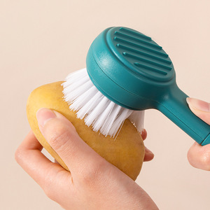 New Design Hot Sale Multi-function two-in-one Fruit and Vegetable Cleaning Brush Paring knife Kitchen Gadgets