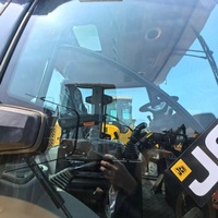 Chargeuse-pelleteuse JCB 4CX d'occasion en bon état, en stock, pour travaux de terrassement et de manutention de matériaux